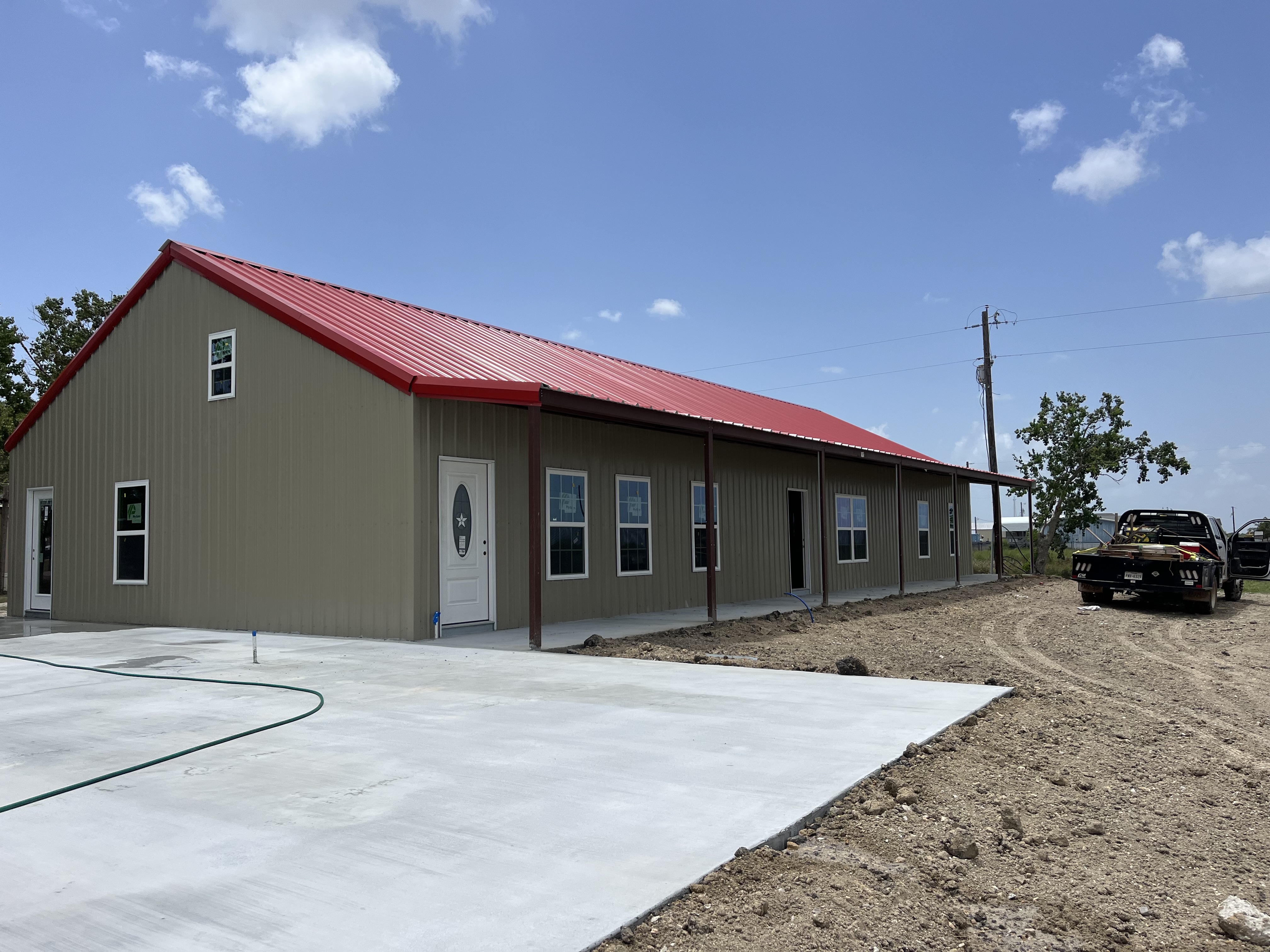 Metal structure project photo with roof and wall framing