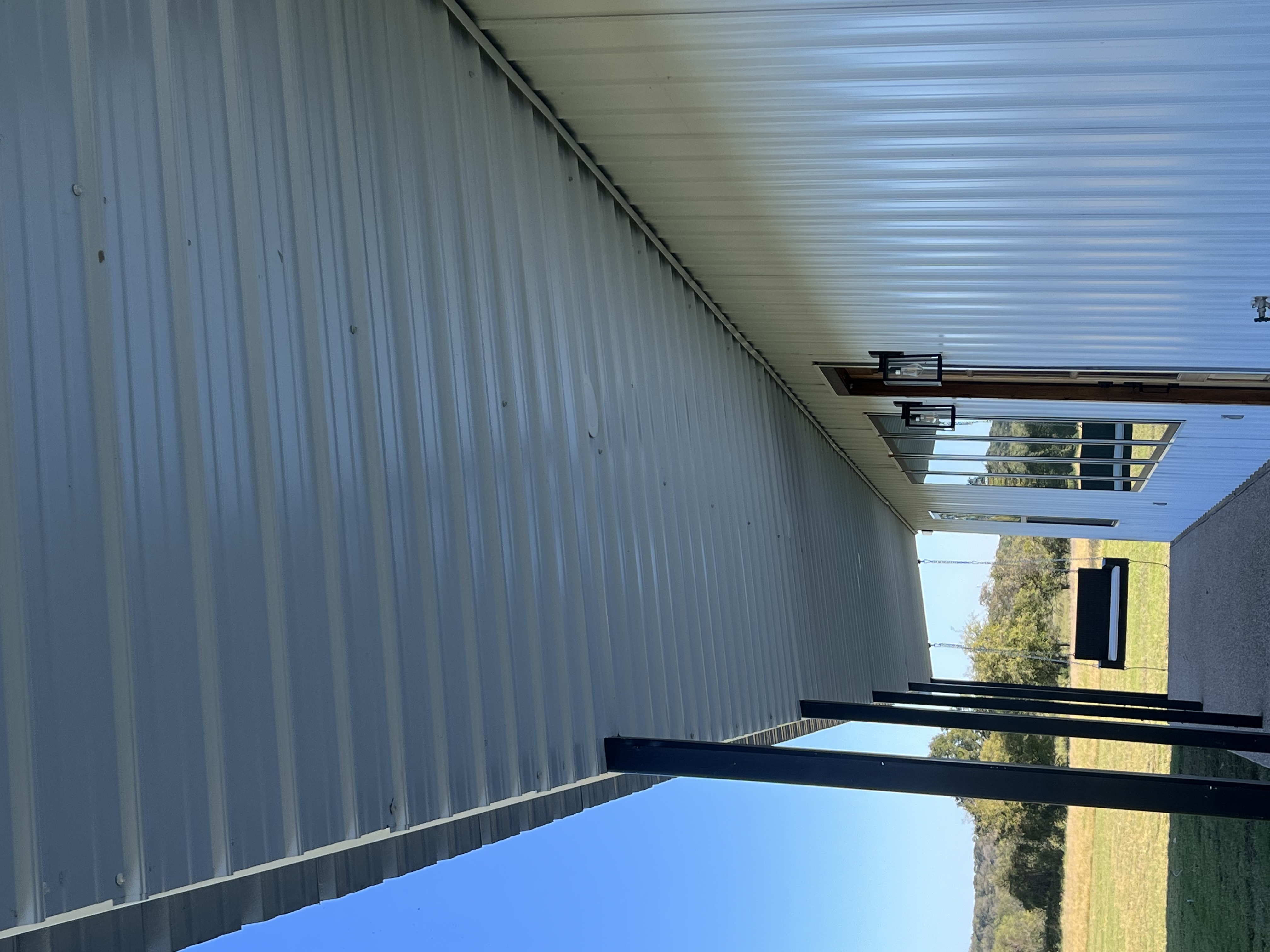 Steel building project photo with exterior panels and trim