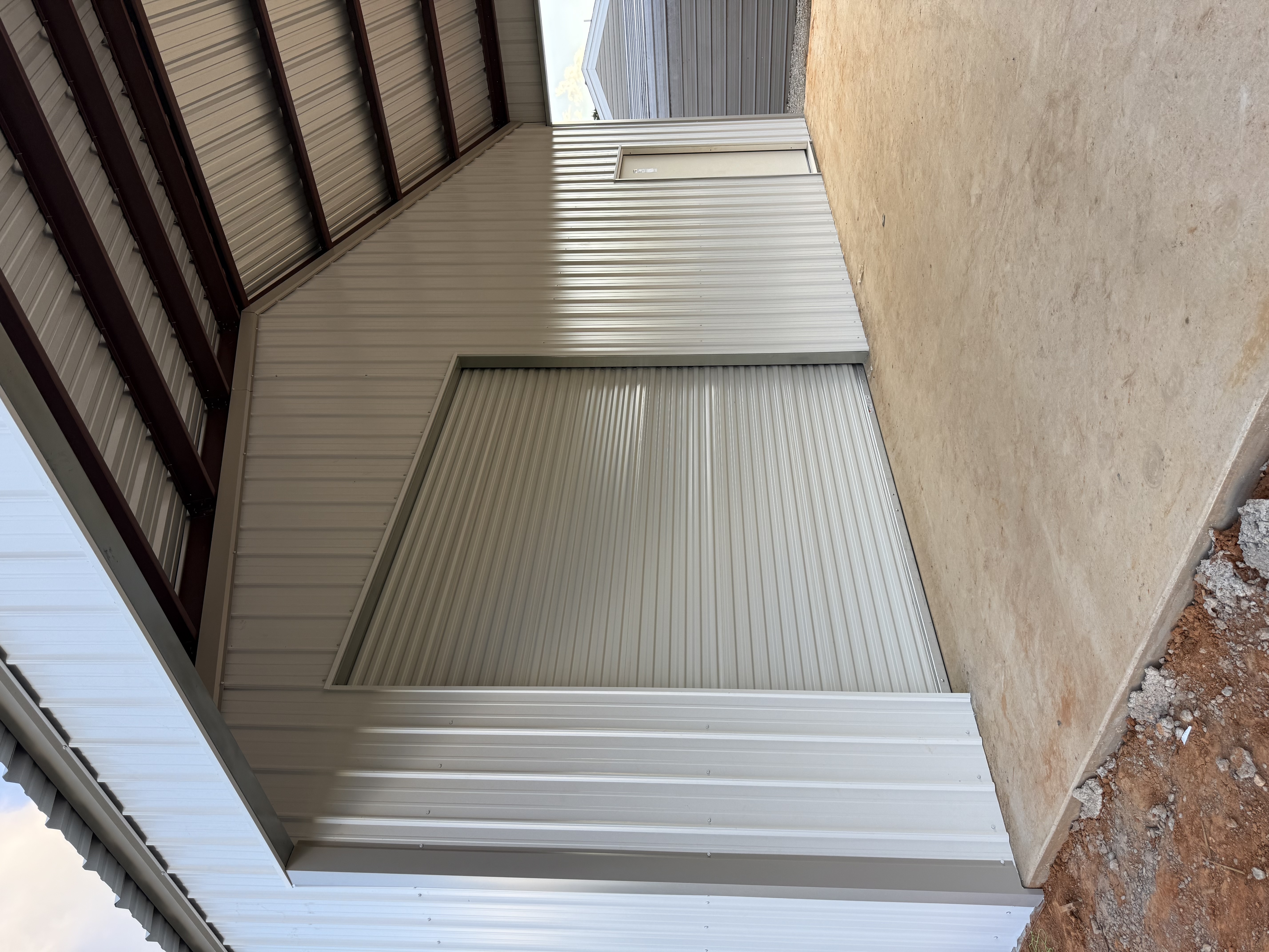 Metal building project photo with covered exterior area